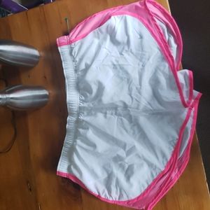 White/pink Nike Tempo shorts